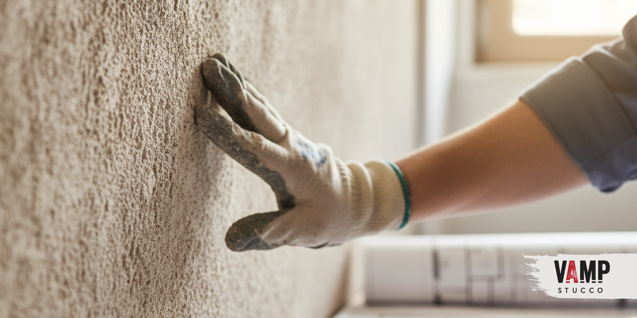 Denver stucco contractor installing EIFS drainage system on commercial building in compliance with ASTM C1063 standards