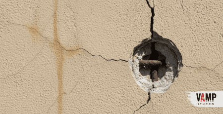 Certified contractors applying a weather-resistant acrylic finish showing commercial stucco installation on a high-rise Denver office building.